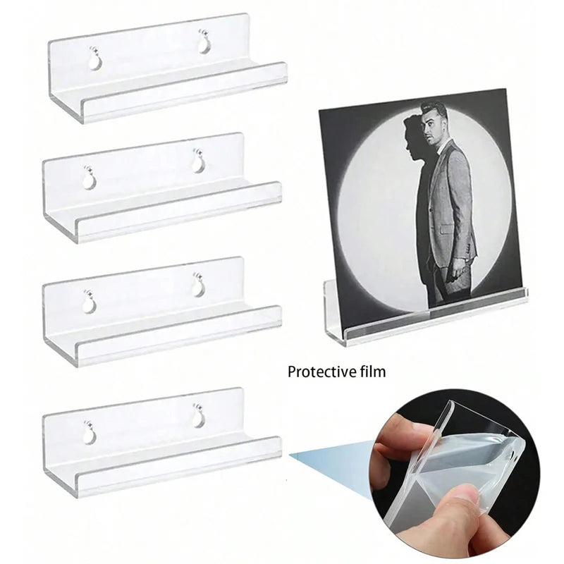 Clear acrylic wall display shelf mounted on a wall