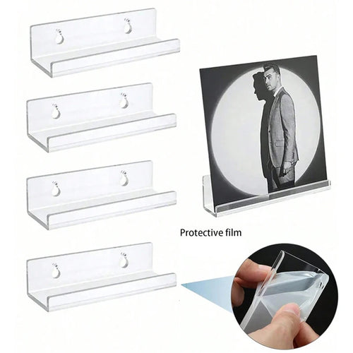 Clear acrylic wall display shelf mounted on a wall