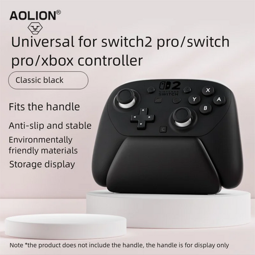 Game controller resting in a clear desk display stand